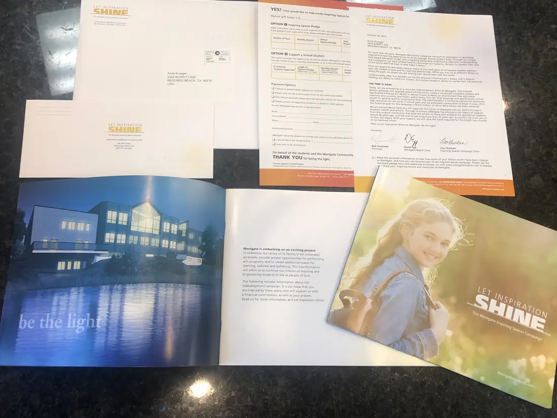 9×12 enveloped school mailer with a full-colour booklet, letter and reply form