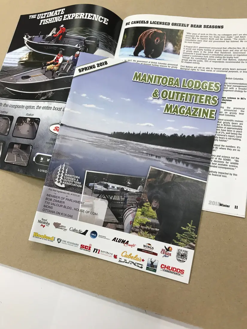 Manitoba Lodges & Outfitters magazine newsletter, front cover and an inside spread
