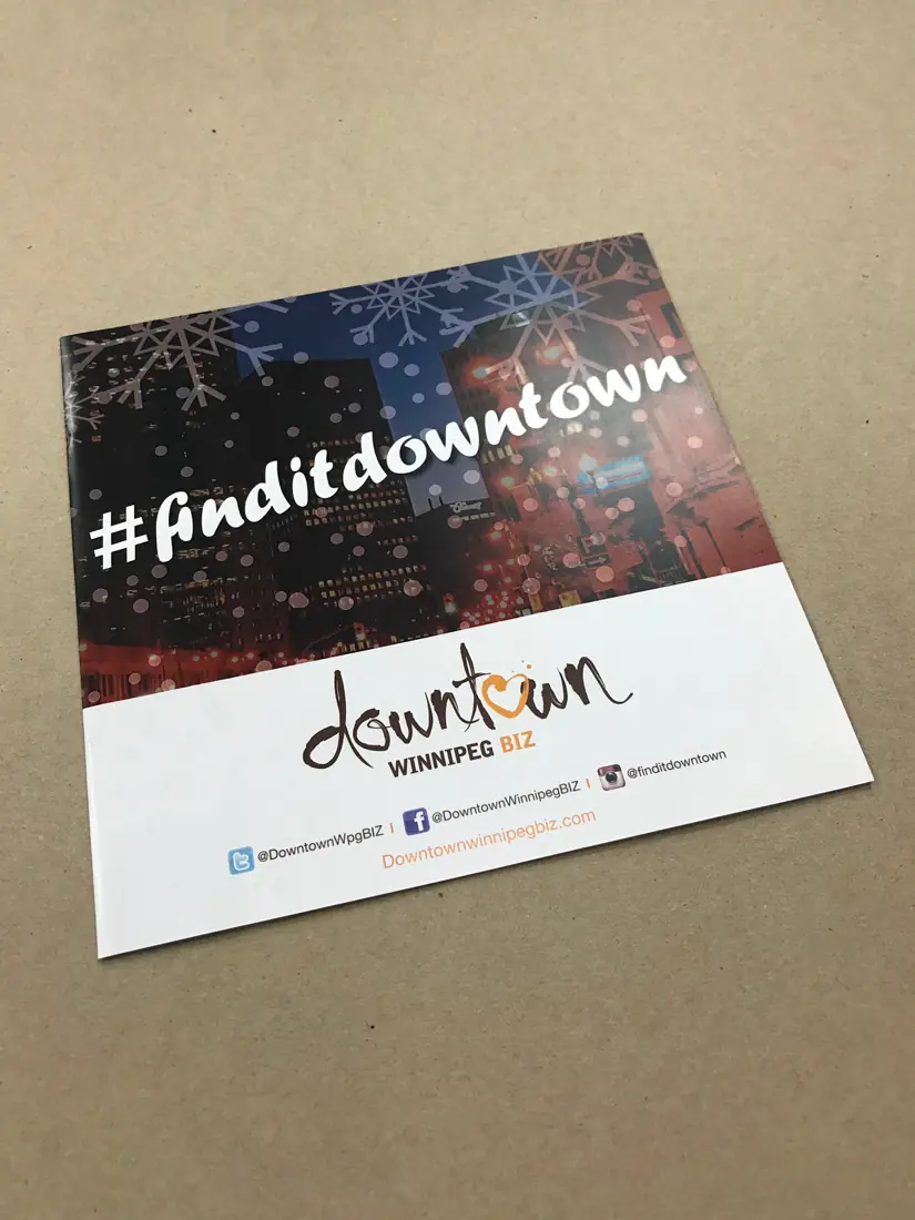 Downtown Winnipeg BIZ “#finditdowntown” square booklet cover