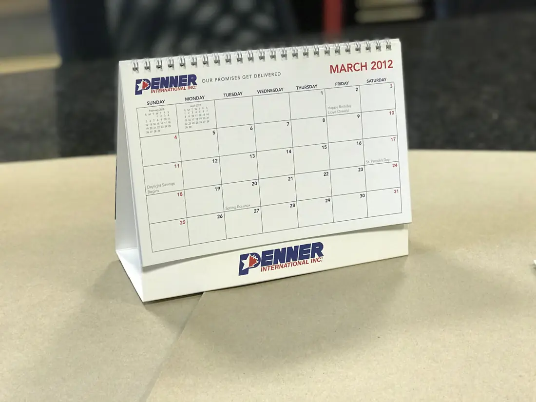 Tent-style desk calendar printed for Denner International