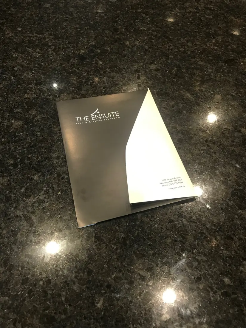 Black presentation folder with silk varnish, open to show the inside pocket