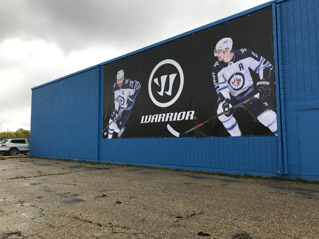 An extra-large vinyl banner on a building